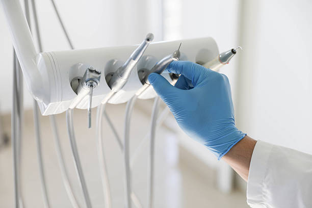 Professional Tooth Extraction technician working in Orlando, FL